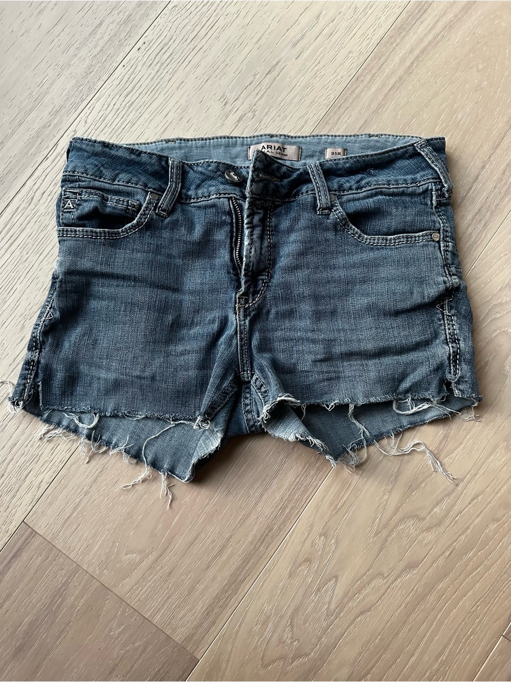 Ariat Distressed Denim Cutoff Shorts in Faded Blue